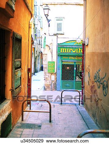 Stock Photo - Europe, outdoors, street, alley, graffitti, store. Fotosearch