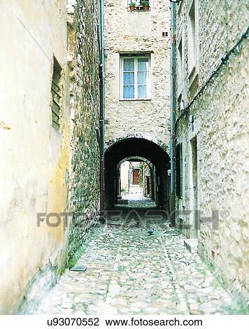 Europe, outdoors, streets, alley, arch, windows View Large Photo Image Stock Image - Europe, outdoors, streets, alley, arch, windows. Fotosearch