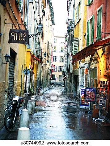 Europe, outdoors, streets, alley, motorcycle, sign View Large Photo Image Stock Image - Europe, outdoors, streets, alley, motorcycle, sign. Fotosearch