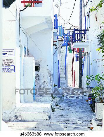 Stock Photo - Europe, outdoors, streets, alley, balcony, plants. Fotosearch