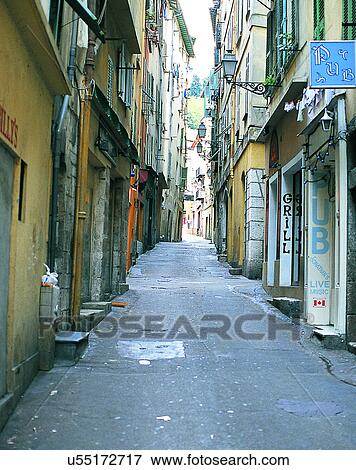 Stock Photo - Europe, outdoors, streets, alley, restaurants, perspective. Fotosearch