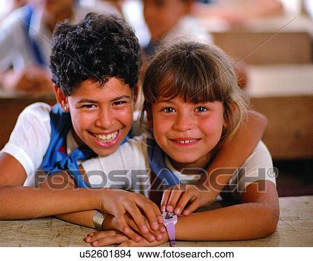 friends, children, smiling, laughing, sitting, uniforms View Large Photo Image Picture - friends, children, smiling, laughing, sitting, uniforms. Fotosearch