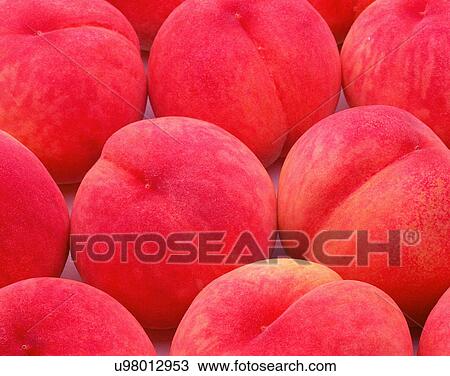 Stock Image - Fruits, nature, fresh, bunch, juicy peaches. Fotosearch