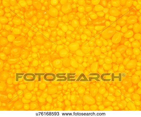 Stock Image - glass, close-up, balls, yellow. Fotosearch