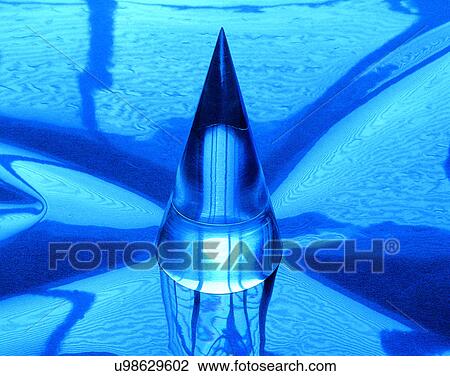 Stock Image - glass, close-up, shapes, cone, light, blue. Fotosearch