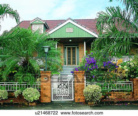 Stock Image - house, outdoors, daytime, architecture, gate, fence. Fotosearch