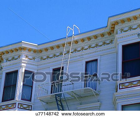 Stock Image - house, outdoors, daytime, architecture, close-up, fire escape. Fotosearch