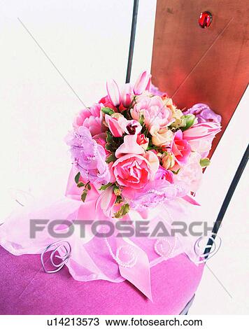 Stock Image - indoors, bouquet, flowers, close-up, chair. Fotosearch