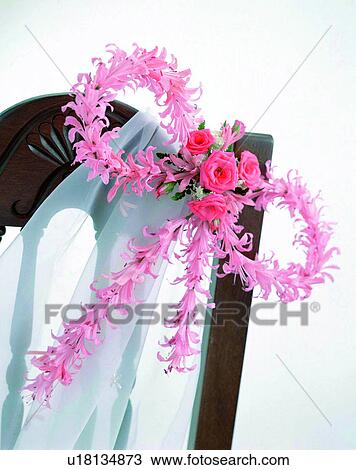 Stock Image - indoors, bouquet, flowers, close-up, chair, pink. Fotosearch