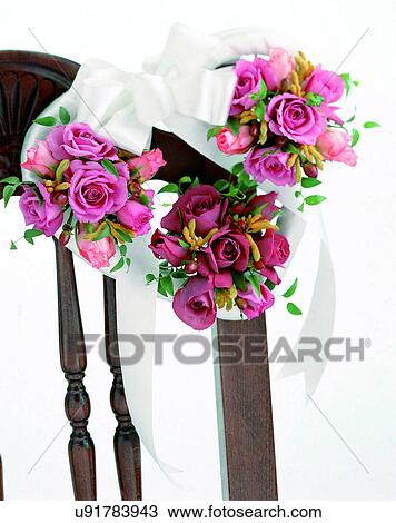 Stock Image - indoors, bouquet, flowers, close-up, chair, roses. Fotosearch