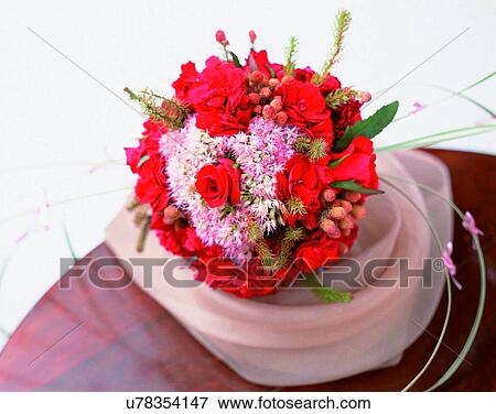Stock Photo - indoors, bouquet, flowers, close-up, table, roses. Fotosearch