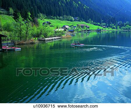 Stock Photography - lakeside, water, nature, mountains, landscape, village. Fotosearch