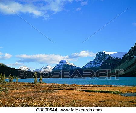 Picture - lakeside, water, nature, sky, mountains, landscape. Fotosearch