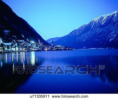 Stock Image - lakeside, water, nature, sky, mountains, landscape. Fotosearch