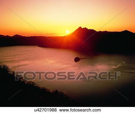 Stock Photo - lakeside, water, nature, sky, sunset, silhouette. Fotosearch