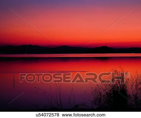 lakeside, water, nature, sky, sunset, silhouette View Large Photo Image Stock Photo - lakeside, water, nature, sky, sunset, silhouette. Fotosearch