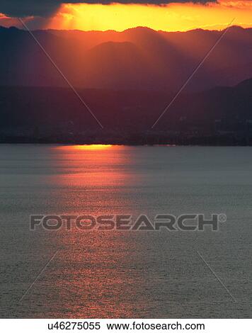 Stock Photography - lakeside, water, nature, sky, sunset, light. Fotosearch