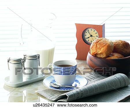 lifestyle, breakfast, bowl, bun, newspaper, tea cup View Large Photo Image Stock Photo - lifestyle, breakfast, bowl, bun, newspaper, tea cup. Fotosearch