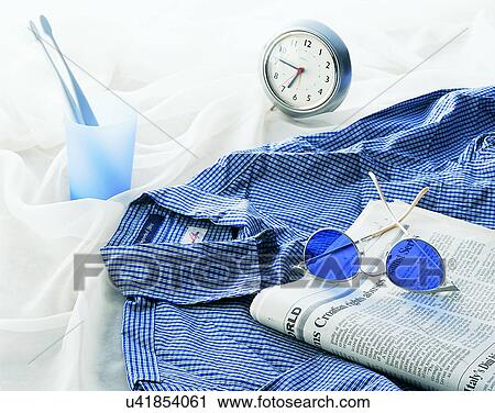 lifestyle, shirt, clock, newspaper, sunglasses, toothbrushes View Large Photo Image Stock Image - lifestyle, shirt, clock, newspaper, sunglasses, toothbrushes. Fotosearch