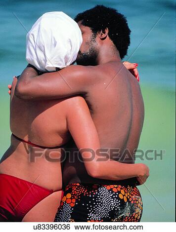 love, couples, beach, swimsuits, swimcap View Large Photo Image Stock Photograph - love, couples, beach, swimsuits, swimcap. Fotosearch