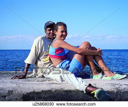 Stock Image - love, couples, companionship, outdoors, young. Fotosearch