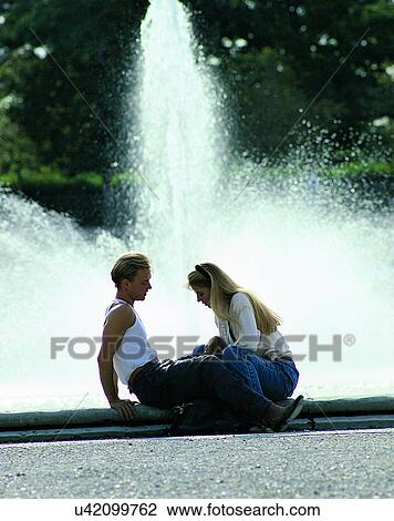 Stock Image - love, couples, companionship, young, woman. Fotosearch