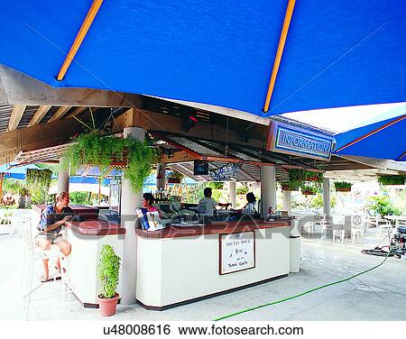 Stock Photograph - Micronesia, tropical, outdoors, bar, café, people. Fotosearch