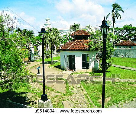 Stock Image - Micronesia, tropical, outdoors, scenery, water, huts. Fotosearch