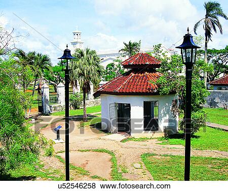 Stock Photo - Micronesia, tropical, outdoors, scenery, hut, trees. Fotosearch