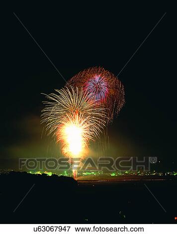 Stock Photo - night time, outdoors, summer, sky, fireworks. Fotosearch