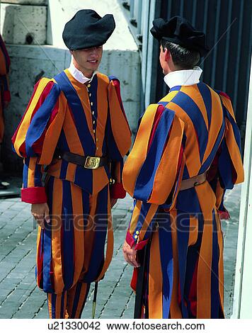 Stock Image - outdoors, Italy, Europe, city, buildings, traditional clothes. Fotosearch
