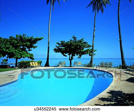 Stock Photography - outdoors, tropical, sky, water, sea, swimming pool. Fotosearch