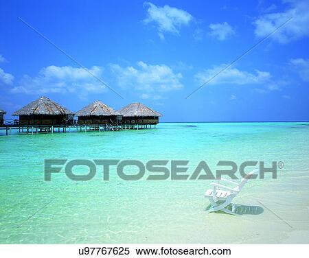Stock Photography - outdoors, tropical, sky, water, sea, chair. Fotosearch
