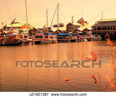 Stock Photo - plants, outdoors, boats, buildings, pier, Australia. Fotosearch