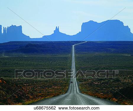 Stock Image - road, outdoor, mountains, sky, light, grass. Fotosearch