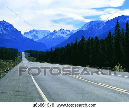 Stock Photo - road, outdoor, sky, light, clouds, snow. Fotosearch
