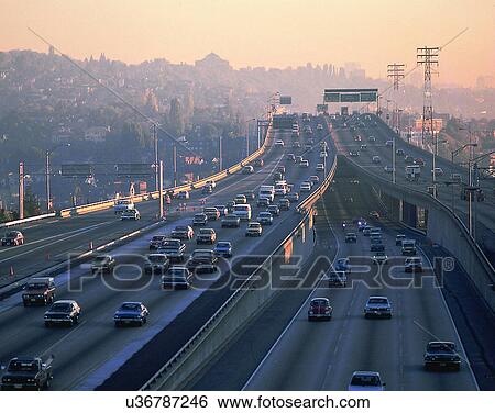 Stock Photograph - road, outdoor, sky, light, clouds, sunset. Fotosearch