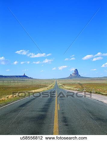 Stock Image - road, outdoor, sky, light, mountains, clouds. Fotosearch