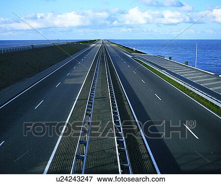 Stock Photo - road, outdoor, sky, light, oceans, clouds. Fotosearch