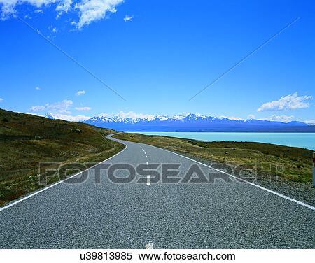 Stock Photography - road, outdoor, trees, sky, lake, grass. Fotosearch