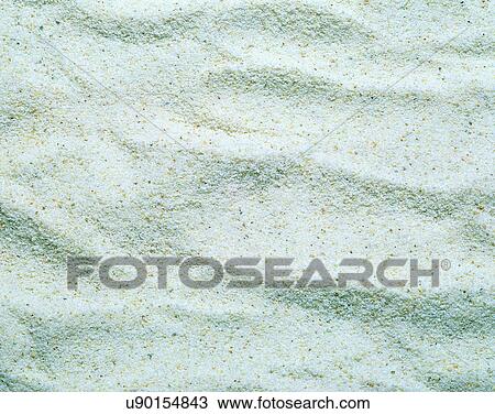 Stock Image - sand, outdoors, close-up, bright, grain, footprints. Fotosearch