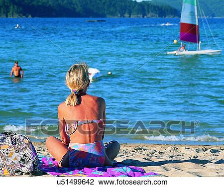 Stock Image - scenery, Australia, water, sky, beach, woman. Fotosearch