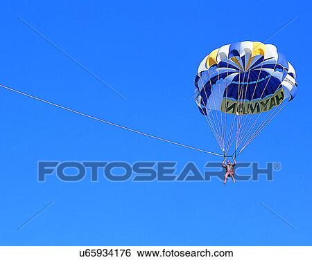 Stock Photograph - scenery, Australia, watersports, sky, parachute, person. Fotosearch