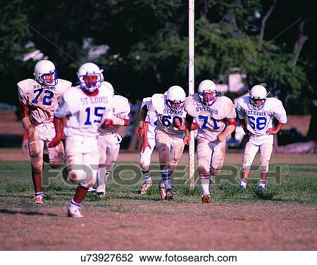 sport, outdoors, football, team, running, field View Large Photo Image Stock Image - sport, outdoors, football, team, running, field. Fotosearch