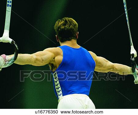 Stock Image - sport, outdoors, gymnastics, hoops, rings. Fotosearch