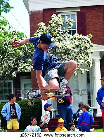 sport, outdoors, skateboarding, person, jumping, crowd View Large Photo Image Stock Image - sport, outdoors, skateboarding, person, jumping, crowd. Fotosearch