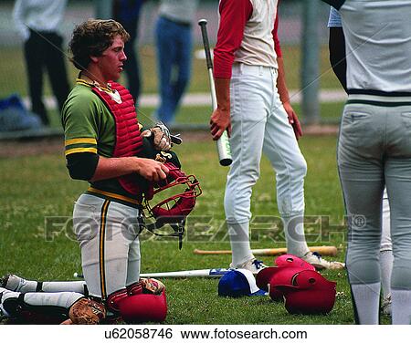 Stock Photograph - sport, outdoors, softball, baseball, players, catcher. Fotosearch
