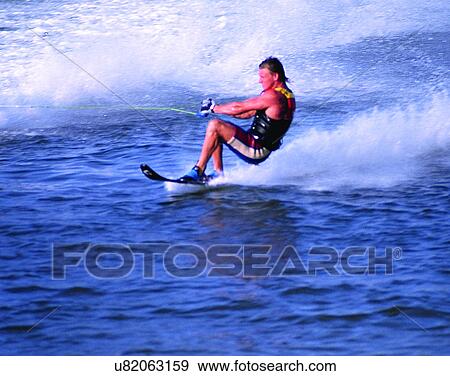Stock Photo - sport, outdoors, water, waterskiing, waves. Fotosearch
