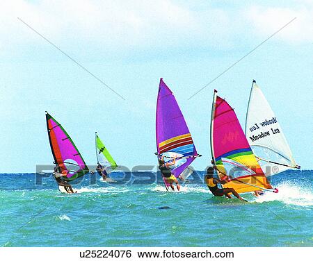 Stock Photograph - summer, outdoors, sky, water, windsurfing, people. Fotosearch