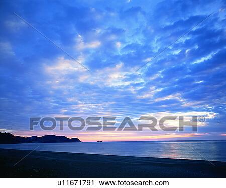 Stock Image - sun light, sun, sky, clouds, outdoors, dawn. Fotosearch